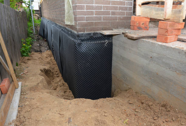 SJ Waterproofing Pros technician performing targeted Waterproofing assessment in Mentor, OH